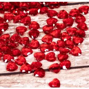 Red acrylic heart shaped faceted gems
