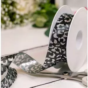 silver animal print lame style ribbon in 25mm width by Berisfords Ribbons