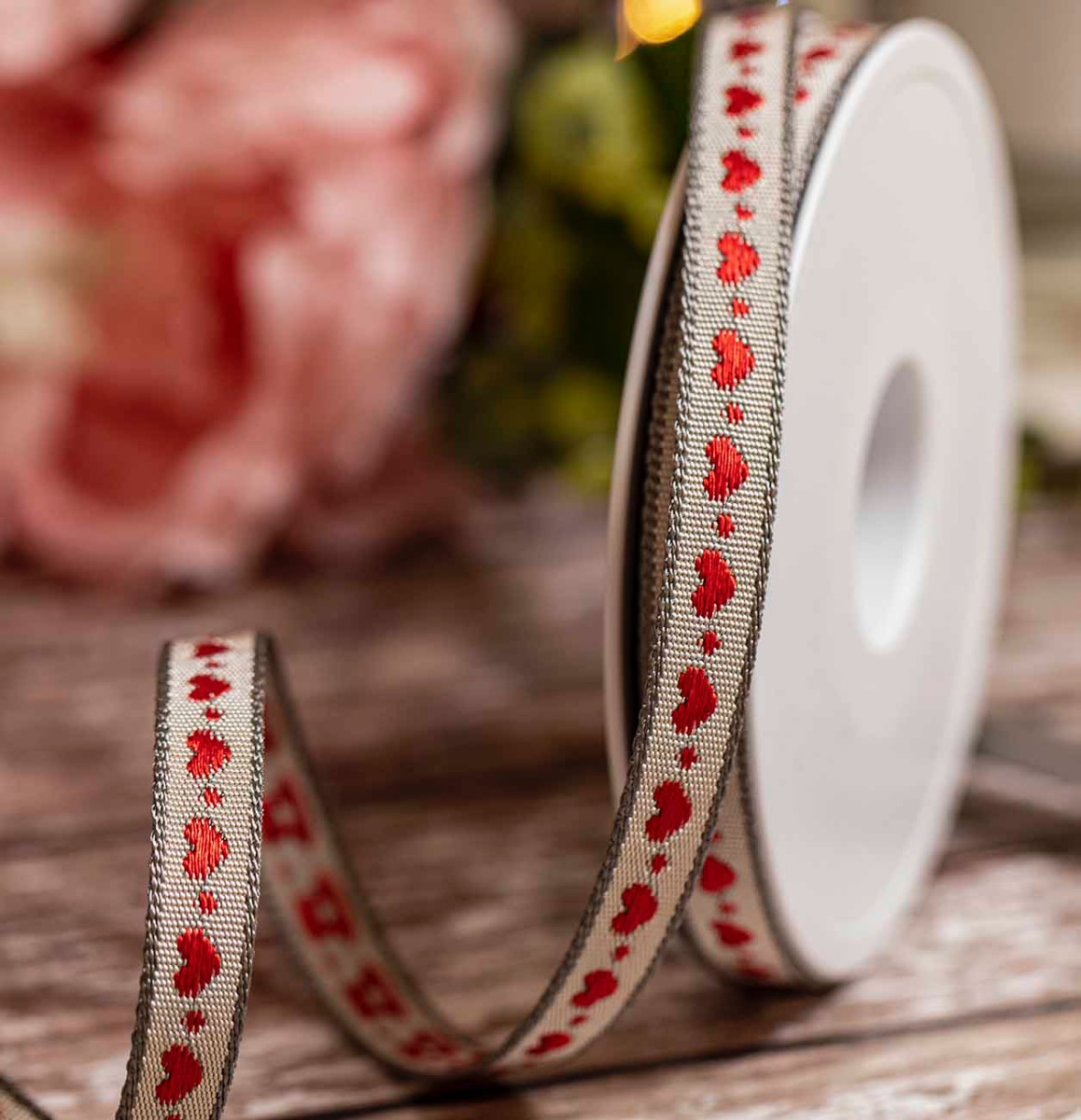 red woven hearts on a grey ribbon in a 10mm width