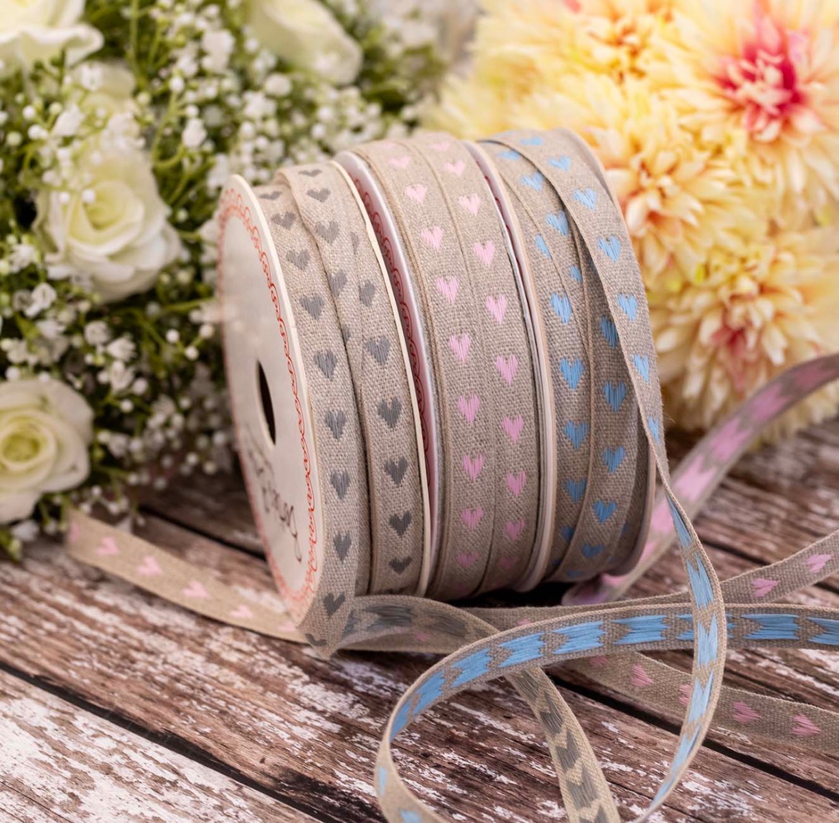 11mm wide linen ribbons on reels with woven heart design